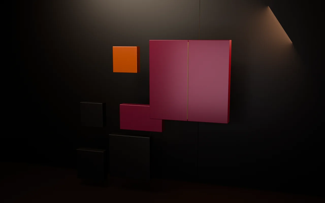 The LaunchPixel mark sculpted in burgundy, terracotta and dark stone.